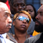 BROWN FAMILY URGES POLICE PROTESTER RESTRAINT