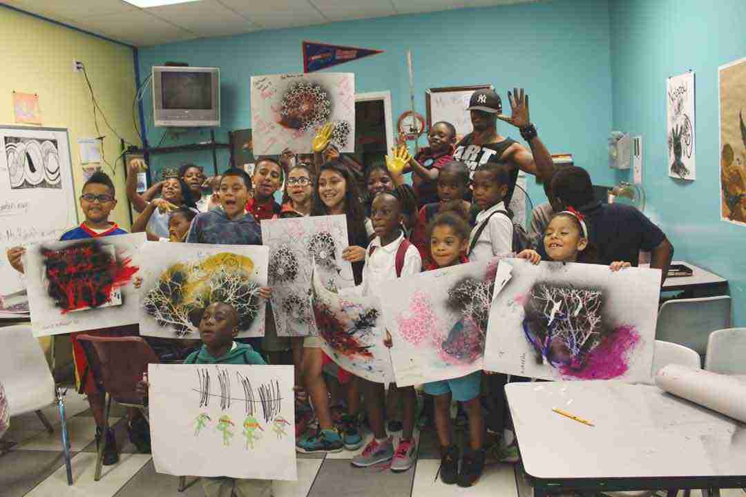 In honor of National Youth Art Month, The Urban Collective and The Black Archives History and Research Foundation of South Florida led dozens of children from the Overtown Youth Center and Urgent Inc. on a tour and discussion of the exhibition to  celebrate late artist Purvis Young,  “A Man Among the People.” The students got a chance to learn about art forms and create their own masterpieces.