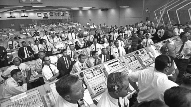 Engineers and scientists working at Kennedy Space Center are seen watching the lift-off of the Apollo 11 rocket vehicle on July 16, 1989. According to a recent study rocket scientists and brain surgeons aren't significantly smarter than the general population. (NASA)